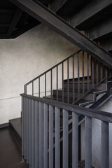 Stairway with a black metallic banister modern building architecture loft-style railings interior design of contemporary.