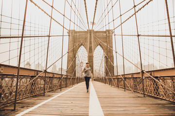 Naklejka na ściany i meble Running on Brooklyn bridge