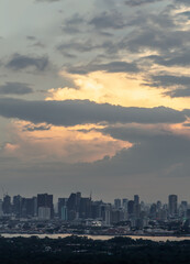 Bangkok, Thailand - Oct 24, 2021: Aerial view of Beautiful scenery view of Skyscraper Evening time Sunset creates relaxing feeling for the rest of the day. Space for text, No focus, specifically.