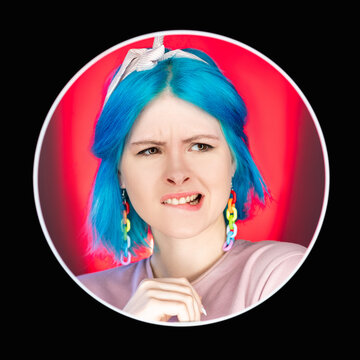 Disgust Expression. Nervous Woman. Cringe Face. Nervous Worried Model Biting Lip With Ouch Emotion Isolated On Red Neon Light Background In Round Black Avatar Icon Frame.