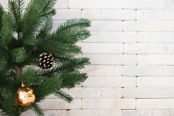 Ornament ball or bauble hang on a christmas tree, xmas background and wallpaper, gray marble brick texture