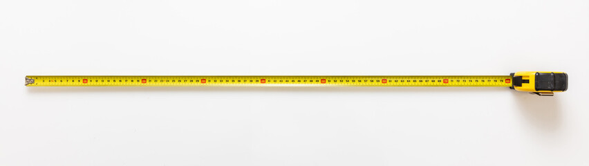 Measure Tape isolated on white background. Metal meter long yellow color, construction hand tool.
