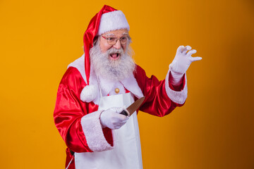Santa Claus holding a knife. Evil Santa Claus concept. Murder.