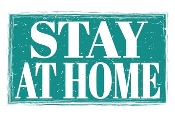 STAY AT HOME, words on blue grungy stamp sign