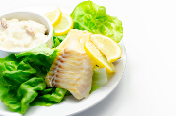 Steamed haddock fillet served with an exquisite salad consisting of cabbage, celery and apple with sultanas and roasted peanuts in mayonnaise