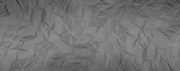 Grey paper crumpled texture background	