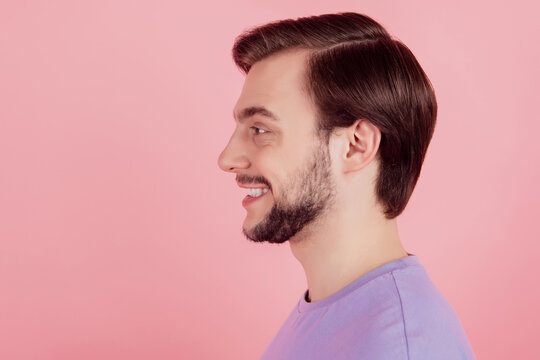 Profile side view photo of young guy look copyspace happy positive smile barber shop isolated over pink color background