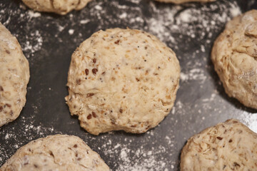 Seededed whole wheat bread dough for baking. selective focus