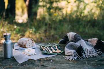 Set of Eco friendly bamboo cutlery, eco bag, mesh bag, bread, nuts, Organic fabric covers for food storage, cheese, reusable coffee mug and water bottle. Sustainable lifestyle. Plastic free concept.