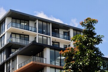 Fototapeta na wymiar An apartment block by the Parramatta River at Meadowbank in Sydney, Australia