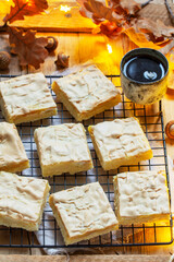 Apple pie slices with meringue served with coffee. Rustic style.