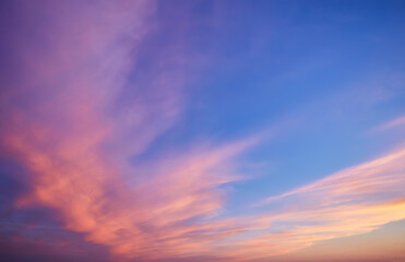 Abstract nature background. Dramatic and moody pink, purple and blue cloudy sky