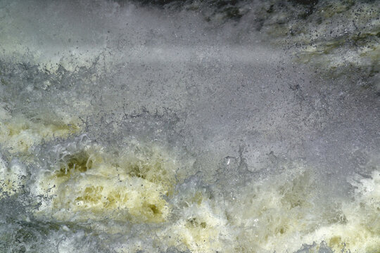 Water Drops Burst To The Air After Impact Of Streaming Water From Dam Spillway.