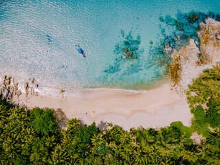Banana Beach, Phuket, Thailand,A beautiful tropical beach with palm trees at Phuket island, Thailand, Banana Beach Located in Choeng Thale, Thalang, Phuket Province, Thailand. High quality photo - obrazy, fototapety, plakaty
