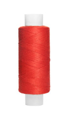 Spool of red sewing thread isolated on white
