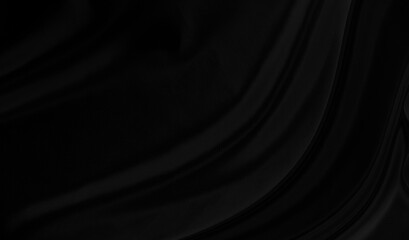 Black gray satin dark fabric texture luxurious shiny that is abstract silk cloth background with patterns soft waves blur beautiful.