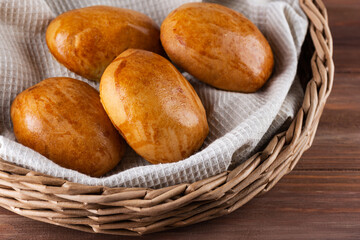 Baked buns on a linen towel.