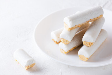 Raw carrot cakes on a white plate. Sugar, gluten and lactose free.