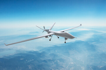 Fototapeta na wymiar Unmanned spy military drone flies over mountains at day time.
