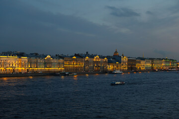 Night Panorama of Brightly Lit Buildings of the Embankment, Reflected in the Waters of the Neva River Modern St. Petersburg at Night