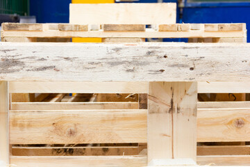 Industrial wooden pallets in factory. Logistics supply concept