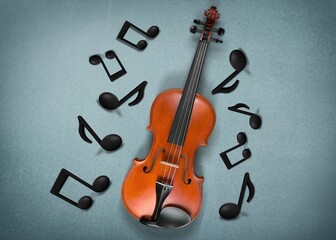 Classic Violin with music notes on desk background