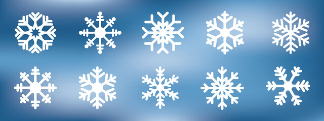 Fototapeta Collection of white snowflake icon on blue blurred background. obraz