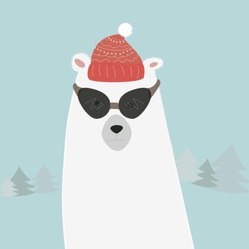 New Year's card. A polar bear in a red hat and dark glasses. On the background of the Christmas tree