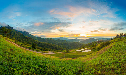 Mountain view of Wat Pha Son Kaew, Phetchabun Province, Thailand,Beautiful sunrise in mountains with white fog below panorama