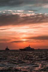 Fototapeta na wymiar sunset over the sea gulf of Izmir ships