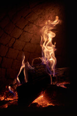 Fire inside a traditional pizza oven