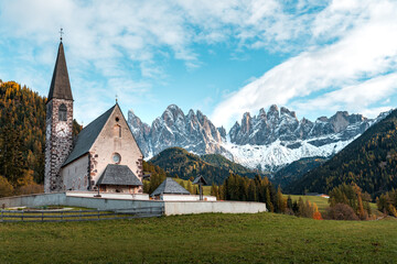 Fototapeta na wymiar Villnoess, Funes Valley, Autumn, Trentino, Italy. Landmark church