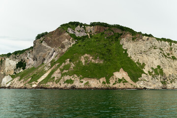 Fototapeta premium View from ocean side on the cliff in Kamchatka