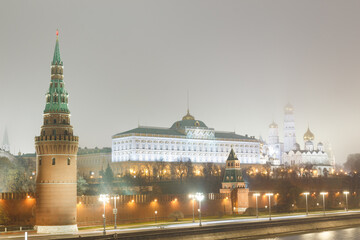 Moscow, Russia.  Classical view of the Moscow Kremlin: Vodovzvodnaya tower, Great Kremlin palace...
