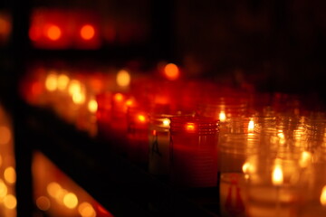 Photo of many candles in the dark