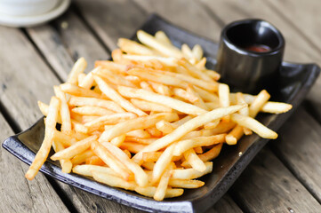 French fries with ketchup , fried potato