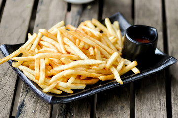 French fries with ketchup , fried potato