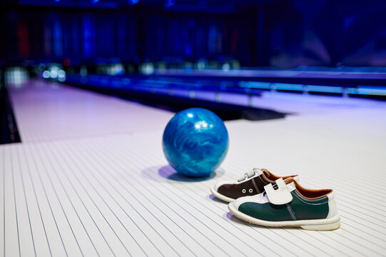 Ball and house shoes, bowling, game concept