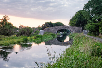 Obraz na płótnie Canvas Ancient Irish Bridge at Sunset