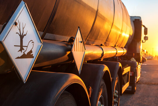 Contamination hazard labels on a tanker truck for the transport of dangerous goods.