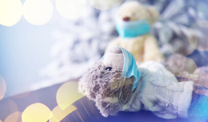 Toy bear in mask to prevent virus spread. Copy space. Teddy bears wearing protective mask. Coronavirus protection.