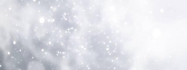 blue snowfall bokeh background, abstract snowflake background on blurred abstract blue