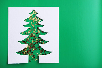 Christmas tree paper cutting design papercraft card.