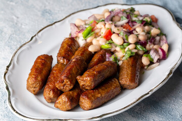 Turkish Tekirdag or inegol Kofte with Piyaz Salad