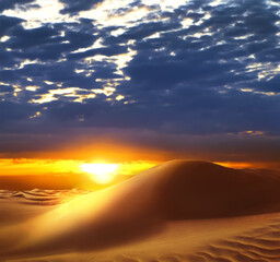 Obraz na płótnie Canvas Beautiful view of sandy desert at sunset