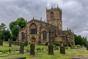 A Photograph of an Ancient, Aged Church in Sheffield, England, front view. - obrazy, fototapety, plakaty