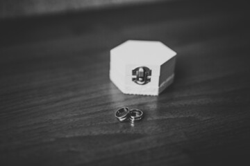 Two golden wedding rings isolated background concept