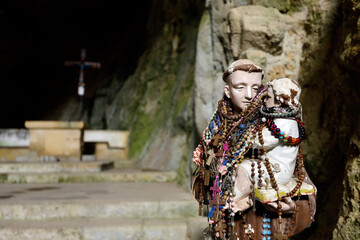 Old religious statue in a French troglodyte chapel