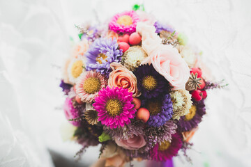 Wonderful luxury wedding bouquet of different flowers