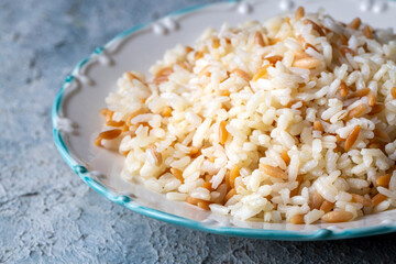 Traditional delicious Turkish food; Turkish style rice pilaf (Turkish name; Arpa sehriyeli pirinc pilavi)